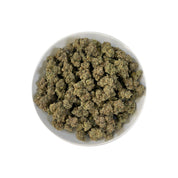 PUFFY Marathon OG is a potent indica-dominant hybrid THCa strain, crafted from the legendary OG Kush lineage, which includes either Chemdawg, Lemon Thai, or Hindu Kush. The aroma is bold and layered, combining gassy sharpness with earthy depth and a touch of warm spice. Visually, the buds are dense and deep forest green, accented by darker undertones, vivid bright orange pistils, and a thick coating of frosty white trichomes, signaling its high potency. Consumers often report a balance of euphoria and relax