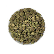 PUFFY Atomic is an indica-dominant hybrid THCa strain created by crossing Chemdawg and OG Kush, then further refined with THC Bomb. The aroma is a bold blend of sharp fuel notes complemented by a pungent intensity and a refreshing hint of lime. Visually, the buds are dense and dark forest-green, accented by vibrant orange pistils and a thick coating of glistening trichomes. Consumers often describe an initial wave of uplifting, euphoric cerebral effects that quickly elevate mood and enhance focus, gradually