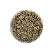 PUFFY Blue Diesel is a balanced hybrid THCa strain, born from the legendary cross between Blueberry and NYC Diesel. The aroma opens with sweet, ripe blueberry notes, blended with sharp diesel undertones and a lively, zesty finish. Visually, the buds are dense and vibrant, showcasing deep forest-green tones accented with subtle purple and indigo hues, bright orange pistils, and a generous coating of sparkling trichomes. Consumers often describe the effects as blissfully euphoric and uplifting, combined with 