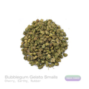 PUFFY Bubblegum Gelato (smalls) is an indica-dominant hybrid THCa strain, was crafted by crossing the flavorful Gelato #45 with the classic Indiana Bubblegum. The aroma is a bold fusion of sweet cherry layered with earthy undertones and a subtle hint of rubber, creating a uniquely rich and intriguing scent profile. Visually, the buds are dense and compact, showcasing deep forest-green hues accented by long, fiery orange pistils and a generous coating of glistening trichomes. Consumers often report an uplift