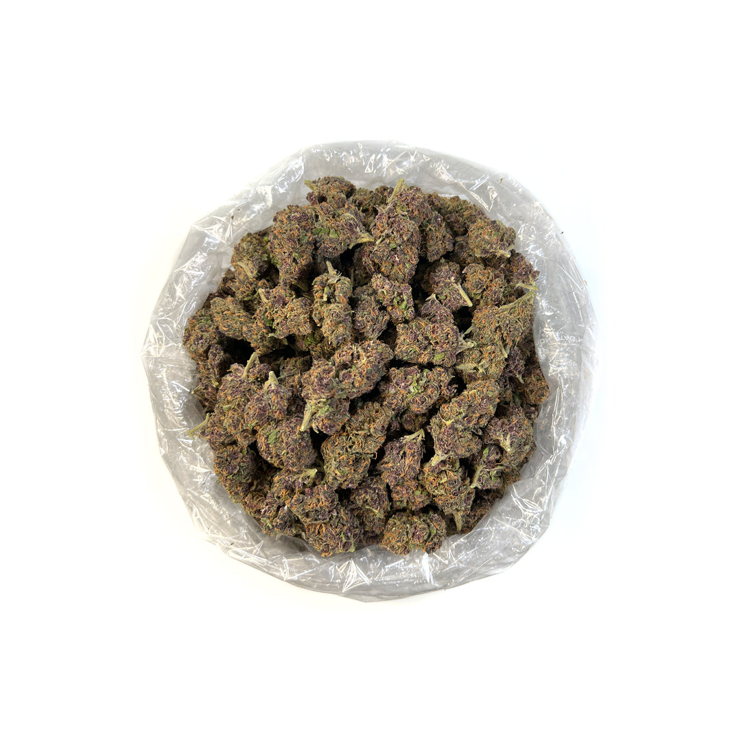 PUFFY Forbidden Fruit THCa is a hybrid of Cherry Pie and Tangie, boasting dense, vibrant buds with deep purple tones, dark green leaves, and striking orange hairs. Flavor is sweet, musky cherry notes complemented by hints of pine, mango, and passionfruit candy. Users describe its effects as hitting hard behind the eyes and delivering profound physical relaxation and mental calm with every puff. Ideal for easing minor discomfort and melting away stress.