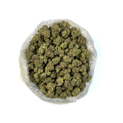 PUFFY Frozen Black Cherry is a potent indica-dominant hybrid THCa strain crafted from the flavorful cross of Black Cherry Gelato and Frozen Margy. This strain boasts a rich, layered aroma profile that blends creamy notes with hints of tropical fruit and a gassy undertone. Visually appealing, its dense, solid buds are blanketed in frosty trichomes and often display deep purple hues, making it as beautiful as it is effective. Consumers often report a deeply relaxing, euphoric, and heavily sedative experience,