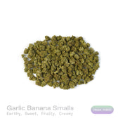 PUFFY Garlic Banana (smalls) is an Indica-dominant hybrid THCa strain born from the flavorful cross of Garlic Cookies × Black Bananas. The aroma opens with rich earthy notes, balanced by a sweet and fruity essence, rounded out with a smooth, creamy finish. Visually, the resinous buds feature forest-green and purple tones, bright orange pistils, and a frosty trichome coating.  Consumers often report a burst of uplifting, euphoric creativity that gradually melts into a soothing full-body calm, gently unwindin