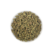 PUFFY Glitter Bomb is an indica-dominant hybrid THCa strain born from the flavorful cross of Grape Gas #10 and OGKB Blueberry Headband. The aroma profile is a rich blend of blueberry, earthy notes, and a skunky finish. Visually, the buds are dense and deep forest green with striking purple hues, bright orange pistils, and a heavy coating of sparkling white trichomes. Consumers report a bright rush of cerebral uplift that gently settles into a soothing, full-body calm, leaving them giggly, focused, and relax