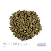 PUFFY GMO x OZK (smalls) is an indica-dominant hybrid THCa strain, born from the legendary cross between GMO (Garlic Cookies) and OZ Kush (OG Kush x Zkittlez). The aroma is distinctly gassy, delivering a sharp, pungent scent that immediately commands attention. Visually striking, the buds are dense, with deep greens and purples glinting beneath a frosty layer of trichomes. Consumers often report a deep, soothing body relaxation paired with a blissful, uplifting mental high.
