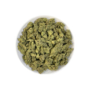 PUFFY GG4, also known as Gorilla Glue #4 is a potent hybrid THCa strain created from a cross between Chem’s Sister, Sour Dubb, and Chocolate Diesel. This strain boasts a bold and pungent aroma, a powerful fusion of gas and sharp menthol, delivering a refreshing scent with a distinct icy edge. The flavor profile is equally rich, offering a harmonious blend of earthy tones, subtle sweetness, and delicate hints of chocolate and coffee. Visually, the buds are dense and chunky, showcasing a vibrant green color a