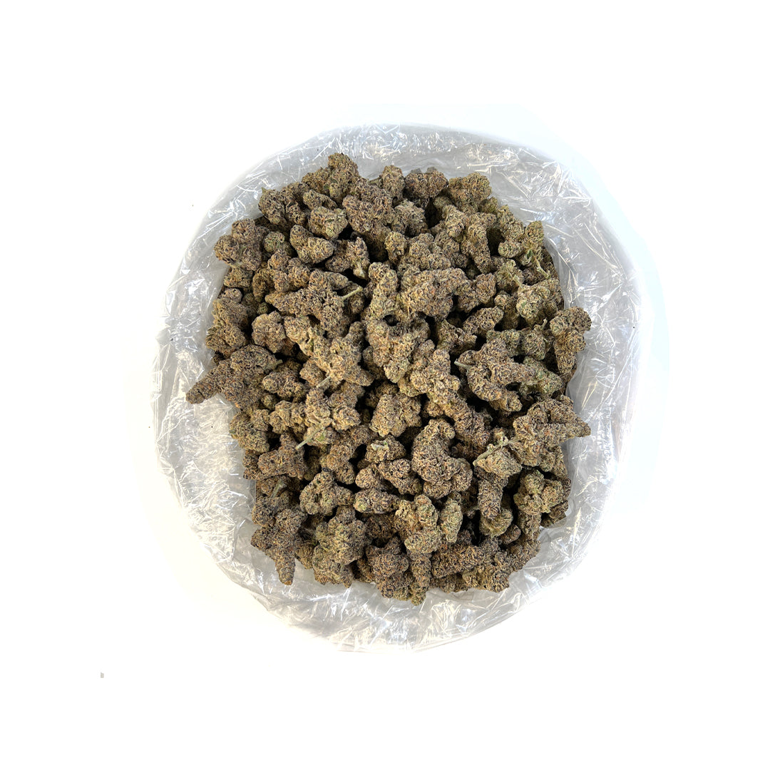 PUFFY Grape Gas THCa offers a distinctive aroma reminiscent of its name: sweet grapes and berries with hints of gas and earthy undertones. This potent strain was created from the fusion of Jet Fuel Gelato and Grape Pie, lending to its formidable properties. Features a deep violet hue with bright purple and green leaves accented with fuzzy, golden-orange hairs, caked with shimmering crystal trichomes. Users reported this as stimulating and blissful, sparking creativity while a subdued body high washes over t