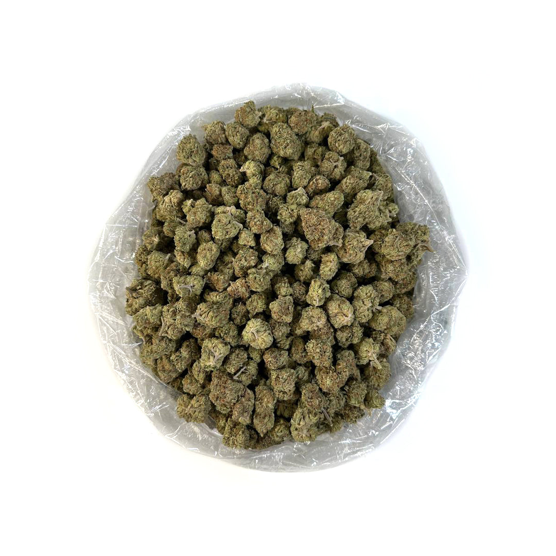 PUFFY Ice Breaker THCA is a perfectly balanced hybrid, crafted from a legendary blend of Skunk, Northern Lights, Shiva, and Afghani Landrace genetics. This powerhouse strain delivers a smooth and complex flavor profile, featuring sweet and floral kush notes, complemented by hints of spicy hash and a subtle woody pine finish. The aroma mirrors the taste, with a rich earthy depth that intensifies as the buds are broken apart. Visually, it’s just as impressive, showcasing long, dense, arrowhead-shaped olive-gr