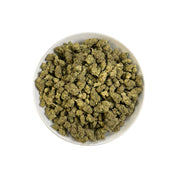 PUFFY Jealousy is a balanced hybrid THCa strain, expertly crafted from a potent cross between Sherbet Bx1 and Gelato 41. The aroma bursts with a funky blend of sharp cheese and pungent garlic, creating a bold, savory scent that instantly stands out. Visually striking, the dense buds display dark purple hues, vivid greens, and fiery orange pistils, all dusted with frosty trichomes. Consumers often note a balanced experience that eases stress and lifts the mood while blending mental relaxation with energetic