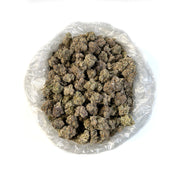 PUFFY LA Pop Rocks is a potent indica-dominant hybrid THCa strain crafted from the flavorful cross of Triangle Kush BX2 and Z Animal. It delivers a striking aroma, a mix of tart green apples, nutty candy sweetness, and a cool hint of icy mint. The flavor profile mirrors this with a sweet and sour apple candy taste, complemented by subtle notes of spicy black pepper and nutty mint. Visually, the buds are long and pepper-shaped with a minty green hue, thick orange pistils, and a generous coating of bright whi
