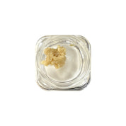 PUFFY THCa concentrate Frozen Bananas, or "Frozen Banana," is a balanced hybrid strain (50% indica/50% sativa) made by crossing OG Kush and Banana Kush. It has a sweet, creamy banana flavor with hints of spice and mint, and a similar aroma featuring bananas, tree fruits, pine, and a touch of diesel.