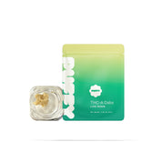 PUFFY THCa concentrate Frozen Bananas, or "Frozen Banana," is a balanced hybrid strain (50% indica/50% sativa) made by crossing OG Kush and Banana Kush. It has a sweet, creamy banana flavor with hints of spice and mint, and a similar aroma featuring bananas, tree fruits, pine, and a touch of diesel.