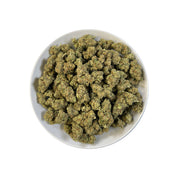 PUFFY MAC 1 (Miracle Alien Cookies) is a balanced hybrid THCa strain, born from the flavorful cross of Alien Cookies F2 with a Miracle 15. The aroma carries smooth notes of butter, uplifted by zesty citrus and rounded out with a creamy finish. Visually captivating, the buds are thick and resinous, shimmering with frosty trichomes, while vibrant orange pistils thread through shades of dark green and purple. Consumers often report it delivers cerebral uplift and body relaxation, with effects that are euphoric