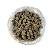 PUFFY MJ Mints is a potent indica-dominant hybrid THCa strain born from the cross of Bubba Kush and Animal Mints. It features a sweet, skunky flavor with a sharp minty finish that leaves a refreshing aftertaste. The aroma is earthy and herbal, accented by spicy and refreshing mint notes. Visually, the buds are dense yet slightly airy, oversized, and rounded displaying a deep forest green hue with golden undertones, super-thin orange pistils, and a frosty layer of golden-amber crystal trichomes. Consumers of
