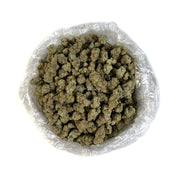 PUFFY Pave THCa is a perfectly balanced hybrid strain, expertly crafted from the potent fusion of Paris OG and The Menthol. This visually stunning strain boasts dense, diamond-shaped forest green nugs, accented by deep purple undertones, fiery red-orange hairs, and a thick coating of frosty, chunky white crystal trichomes, giving it a dazzling, sparkling appearance. Its aroma profile is bold and pungent, blending funky, garlic, cheesy, skunky, and chemical notes for an unforgettable scent. Consumers report 