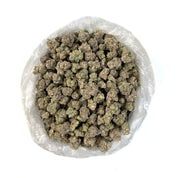 PUFFY Pop Rox is a rare indica-dominant hybrid THCa strain created by crossing ZKZ with Moonbow. This strain boasts a rich and flavorful profile, blending sugary sweetness with tangy citrus notes and a smooth, herbal finish. Its aroma is striking, pungent yet refined with hints of citrus, floral tones, and jasmine. Visually, buds are dense, resin-coated, and display deep shades of purple, green, and orange, all dusted with a thick layer of sparkling trichomes that give them a frosty, crystalline appearance.