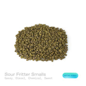 PUFFY Sour Fritter (smalls) is a sativa-dominant THCa strain born from the flavorful union of Apple Fritter and Sour Diesel. The aroma is a bold fusion of gassy diesel notes layered with a sharp chemical edge, rounded out by an underlying sweet finish. Visually, the buds are dense and compact, showcasing deep forest greens with flashes of royal purple and silver, accented by fiery orange pistils and blanketed in a sparkling frost of glistening trichomes. Consumers often report its effects as a bright, mind-