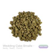 PUFFY Wedding Cake (smalls) is an indica-dominant hybrid THCa strain created by crossing Triangle Cherry Pie and Girl Scout Cookies (GSC). The aroma is a captivating mix of pungent gas, layered with sweet undertones and delicate floral accents for a balanced yet striking profile. Visually, the buds are dense and vibrant, with forest green and purple hues coated in frosty trichomes and bright orange pistils. Consumers often report a euphoric, uplifted mood paired with a relaxing body high, along with a creat