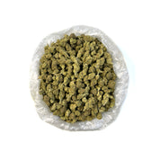 Puffy White Lotus is an indica-dominant hybrid THCa strain resulting from a cross between The White and Snow Lotus. The aroma is a bold medley of funk, ripe peaches, and pungent blue cheese, perfectly mirroring the strain’s complex and unforgettable flavor. Visually, the buds are striking: medium-sized and dense with a light minty-green hue, adorned with olive-toned sugar leaves, fiery orange pistils, and a thick, milky-white layer of trichomes that give it a frosted appearance. Consumers often report that 