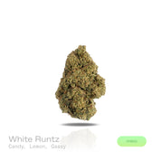 PUFFY White Runtz is a balanced hybrid THCa strain, created from a cross between Gelato and ZKZ. The aroma bursts with sweet candy notes balanced by zesty lemon and a bold gassy undertone. Visually, the buds are dense and frosty, showcasing vibrant green hues with occasional purple accents, all coated in a thick layer of white trichomes. Consumers frequently describe experiencing a euphoric and uplifting sensation, accompanied by an improved mood and a gentle, soothing sense of relaxation.

