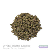 PUFFY White Truffle (smalls) is an indica-dominant hybrid THCa strain, crafted from the legendary lineage of Gorilla Butter, a standout phenotype of Gorilla Glue #4 × Peanut Butter Breath. The aroma is rich and inviting, with doughy undertones layered over an earthy base and a distinctly pungent finish that lingers pleasantly in the air. Visually striking, these medium-sized buds glisten under a thick frost of white trichomes, with vibrant orange pistils winding through deep green and purple tones. Consumer