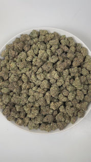 
PUFFY Lemon Cherry Gelato is an indica-dominant  hybrid THCa strain, expertly crafted from a potent cross between Sunset Sherbet and Girl Scout Cookies. The aroma is a lively combination of sweet cherry, playful gassy notes, and bright fruity undertones, creating a vibrant and tantalizing scent profile. Visually, buds are dense and frosty, featuring deep green and purple hues with bright orange pistils and a thick coating of sparkling trichomes. Consumers often report an initial wave of uplifted, happy eup