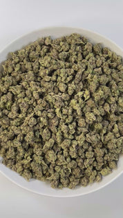 PUFFY Gelato 33 (smalls) is a hybrid THCa  strain, expertly crafted by crossing the legendary Sunset Sherbet and Thin Mint GSC. The aroma is a striking mix of sweet, fruity notes layered with sharp chemical undertones and a cool, invigorating hint of menthol. Visually, the buds are compact and chunky, with dark green to purple hues, vibrant orange pistils, and a frosty trichome coat. Consumers often report fast-acting, uplifting effects that bring mental clarity, elevated mood, stress relief, and a natural 