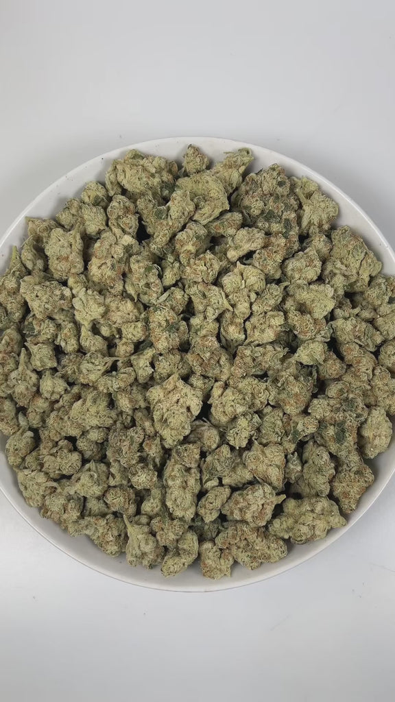 PUFFY Strawberry Cream is a sativa-dominant hybrid THCa strain crafted from the powerful cross between Strawberry Cough and The White. The aroma greets you with luscious notes of sweet strawberry, velvety cream, and a hint of smooth vanilla, creating an irresistibly rich and inviting scent. Visually, dense green buds with purple hues and fiery orange pistils are coated in sticky trichomes. Consumers often report an energetic, talkative, and uplifted mood, experiencing clear-headed cerebral stimulation with 