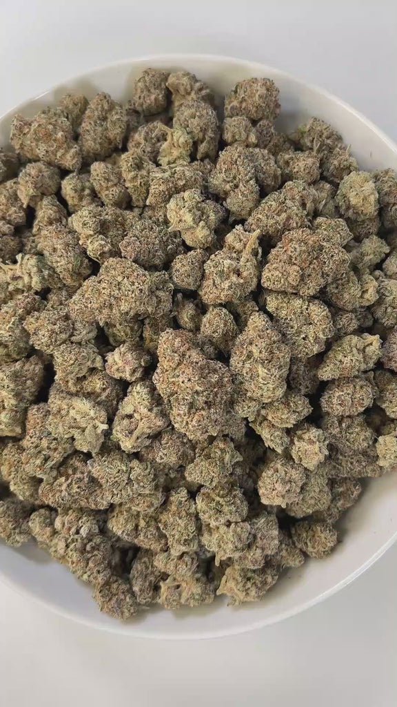 PUFFY Sub Zero is an indica-dominant hybrid THCa strain, often bred from legendary parents like Northern Lights and White Widow. The aroma is a sharp and intriguing blend of chemical notes, bright citrusy grapefruit, and soft floral undertones. Visually dense, frosty buds showcasing deep green hues coated in icy white trichomes, accented by vibrant orange or amber pistils. Consumers often describe its high as deeply soothing, cozy, and euphoric, making it an excellent choice for melting away physical discom