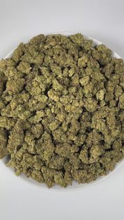PUFFY Sour Candy is a sativa-dominant hybrid THCa strain, born from the flavorful cross of Sour Diesel and Bubblegum. The aroma bursts with bright citrus notes, layered with sweet undertones and a bold gassy finish that adds depth and intensity to its scent profile. Visually, the buds showcase a dense structure with light forest-green hues, vibrant orange pistils, and a generous frosty blanket of sparkling trichomes. Consumers often describe a cheerful, talkative high that sparks creativity and social ease,