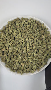 PUFFY Permanent Marker (smalls) is an indica-dominant hybrid THCa strain, born from the complex cross of Biscotti, Jealousy, and Sherbet BX. The aroma opens with bright citrus notes layered over warm, woody undertones, rounded out by a soft floral sweetness that adds depth and elegance to the overall scent profile. Visually striking, the buds feature deep purple and green hues, bright orange pistils, and a thick coating of sparkling resinous trichomes. Consumers often report a blissful euphoria that uplifts