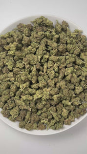 PUFFY Candy Gelato is a balanced hybrid THCa strain born from a complex cross of Blue Oreoz × Cotton Candy Gelato / Candyland × GG4 × Gelato. The aroma teases the senses with a decadent blend of sweet candy, smooth cream, and a bold gassy finish for a truly indulgent profile. Visually, its dense, colorful nugs range from dark forest green to vibrant purple, often coated in a heavy layer of frosty trichomes. Consumers commonly report a fast-acting euphoric lift, delivering mental stimulation and a creative s