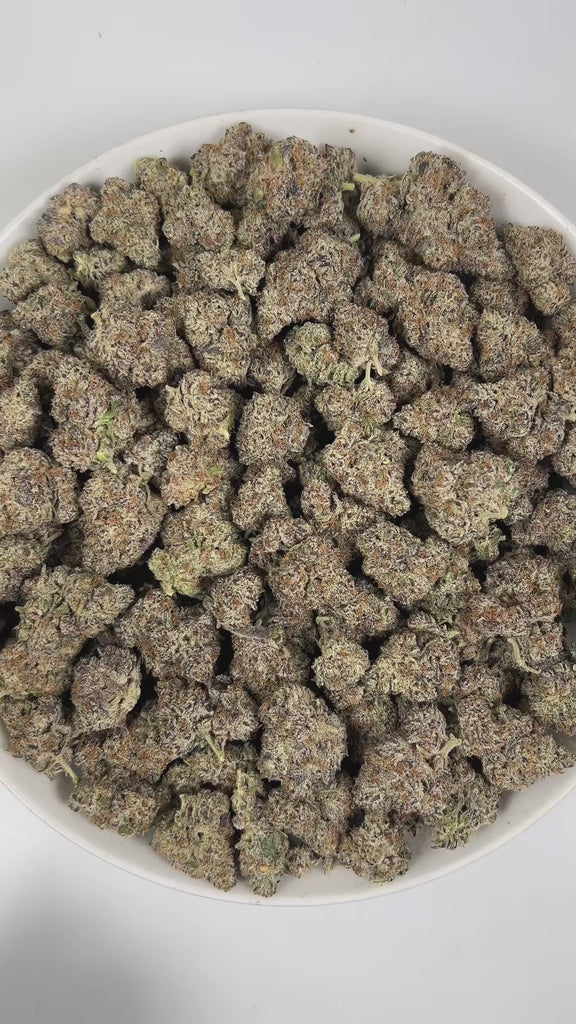 PUFFY Pink Ice is a balanced hybrid THCa strain, expertly crafted from a flavorful union of Pinky and Ice Cream Cake. The aroma is rich and inviting, with doughy notes complemented by hints of chocolate and a subtle, gassy undertone. Visually, dense green buds with hints of purple, bright orange pistils, and a thick coating of sparkling trichomes. Consumers frequently describe a bright, mood‑lifting cerebral buzz that sparks positivity and motivation, paired with a light body calm that keeps the experience 