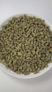 PUFFY White Runtz (smalls) is a balanced hybrid THCa strain, created from a cross between Gelato and ZKZ. The aroma bursts with sweet candy notes blended with zesty oranges and a bold hint of gas. Visually, the buds are dense and frosty, showcasing vibrant green hues with occasional purple accents, all coated in a thick layer of white trichomes. Consumers frequently describe experiencing a euphoric and uplifting sensation, accompanied by an improved mood and a gentle, soothing sense of relaxation.
