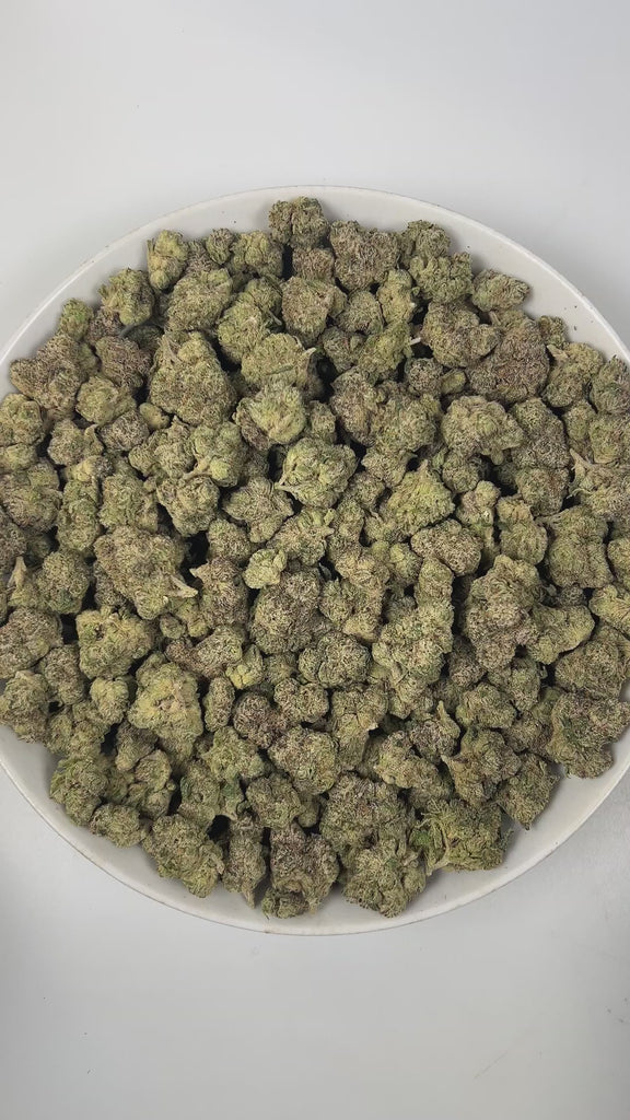 PUFFY Gary's Cherries is a well-balanced hybrid THCa strain, born from the exquisite cross of Cherry Fritter and Gary Payton. The aroma is a zesty fusion of tangy lime, sweet candy, and pungent gassy notes, creating a vibrant and irresistible scent. Visually, the dense buds display forest green and purple hues, highlighted by orange pistils and a sparkling layer of trichomes. Consumers often report a balanced high that begins with an uplifting, clear-headed euphoria, followed by gentle relaxation, making it