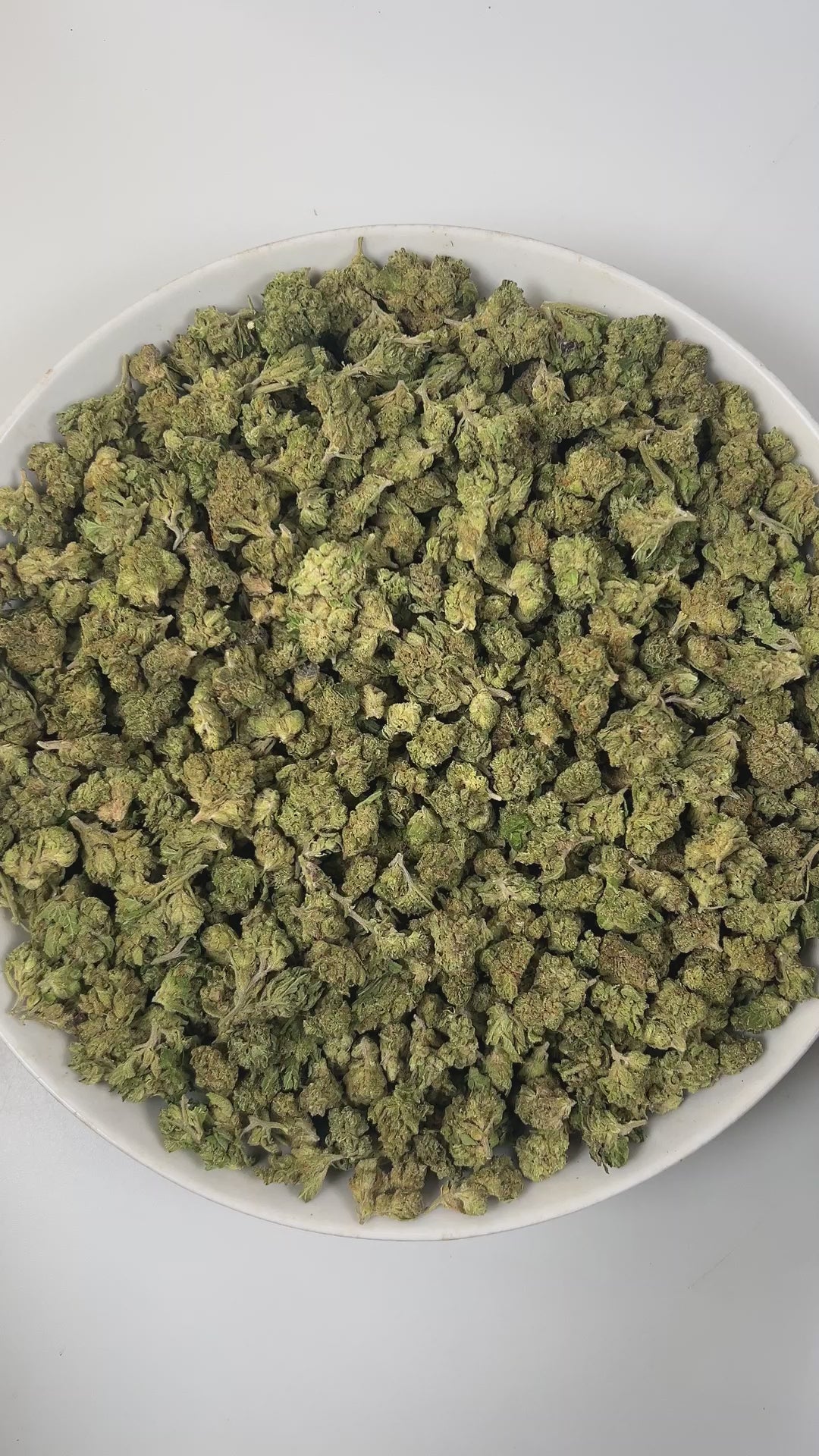 PUFFY Passion Fruit (smalls) is a sativa-dominant hybrid THCa strain, originating from the deliciously vibrant fusion of Sweet Pink Grapefruit and Orange Bud. The aroma opens with bright citrus notes, grounded by earthy undertones and finished with a sharp, pungent edge. Visually, the dense buds showcase rich green and purple hues, accented by vibrant orange pistils and a generous coating of sparkling trichomes. Consumers often experience a lively, invigorating effect that sparks imagination, heightens focu