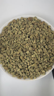 PUFFY Apple Mac (smalls) is a balanced hybrid THCa strain, crafted by crossing the renowned MAC 1 with the potent Trophy Wife. The aroma is a distinctive blend of crisp apple, rich cheesy notes, and grounding earthy undertones. Visually, the dense buds feature forest‑to‑lime green calyxes with hints of purple, bright orange pistils, and a frosty coating of trichomes. Consumers often report an even blend of energizing mental effects and soothing body calm, which may help alleviate stress, anxiety, mood fluct