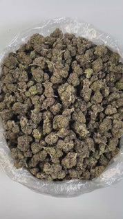 PUFFY Cherry Sunset is a premium hybrid THCa strain, artfully bred from the flavorful genetics of Cherry Pie and Sunset Sherbet. It has a rich, pleasant smell with citrusy limonene, peppery caryophyllene, and hints of mint or flowers. The flavor is mostly fruity cherry, with touches of citrus, tropical sweetness, mint, and spice, making it tasty and complex. Visually striking, it features dense buds with vibrant purple hues, bright orange hairs, and a heavy coating of glistening resin. Consumers describe it