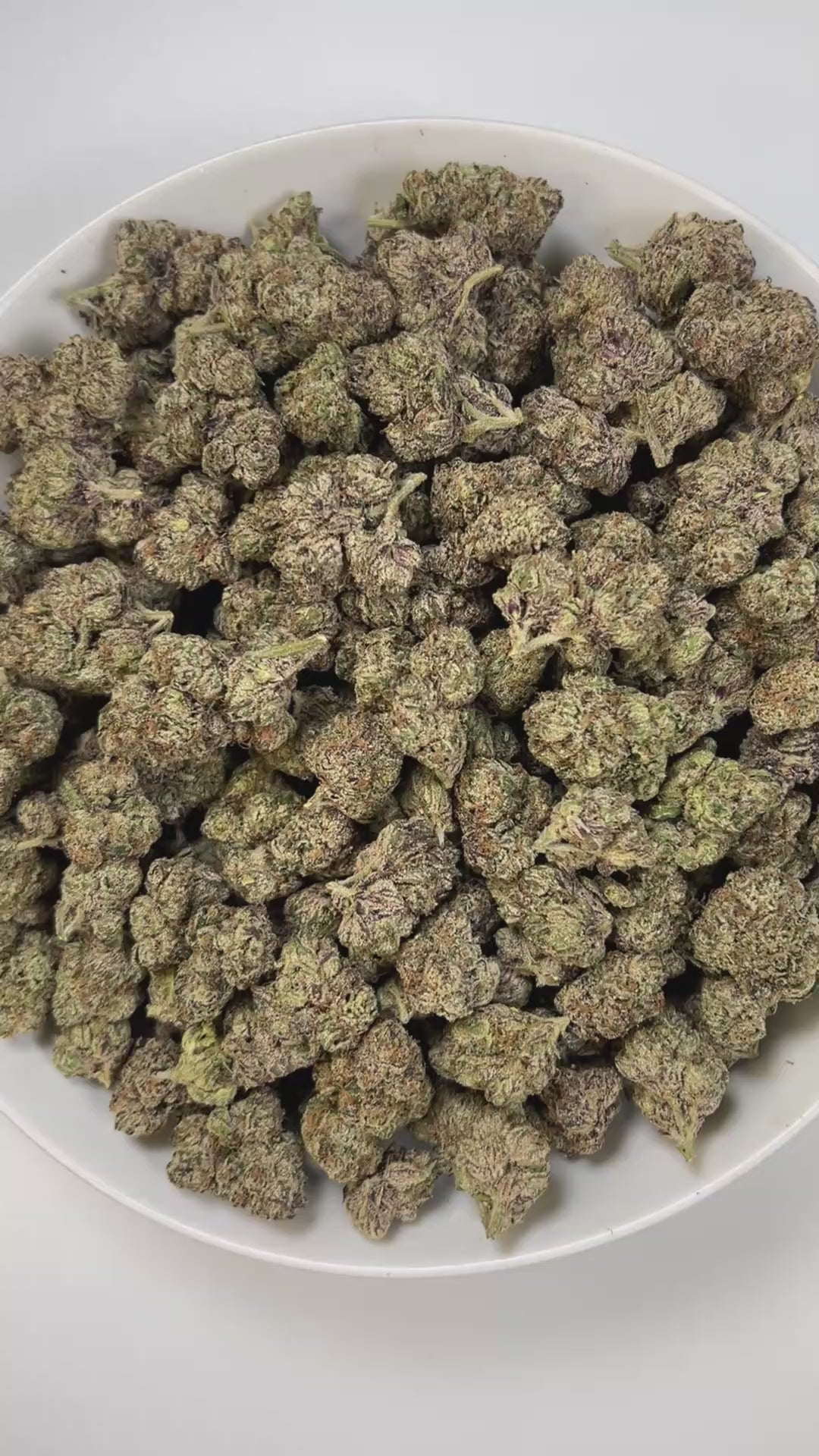 PUFFY Rainbow Candy is an indica-dominant hybrid THCa strain created by crossing ZKZ × Dosidos. Aroma is sweet and candy-like, layered with ripe berries and finished with a sharp chemical edge. Visually striking, these buds are bold in size with layered green tones, fiery pistils, and a crystal-dusted surface that catches the eye. Consumers often report a deeply soothing body calm that melts away tension while simultaneously lifting the spirit into a joyful, euphoric state.
