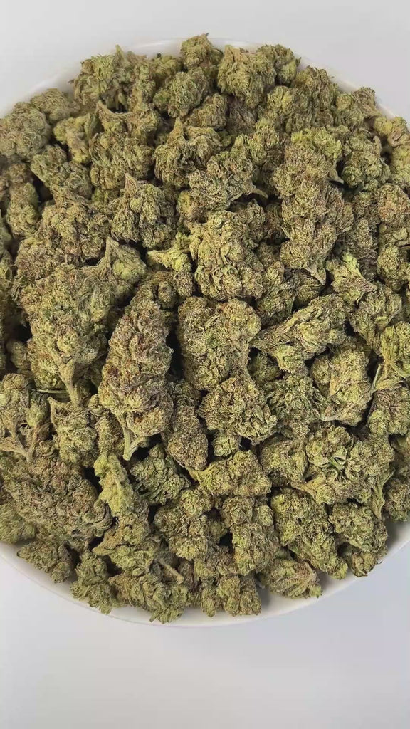PUFFY Lemon Cherry Gelato is an indica-dominant  hybrid THCa strain, expertly crafted from a potent cross between Sunset Sherbet and Girl Scout Cookies. The aroma bursts with bright lemon and fruity notes, balanced by a sharp hint of diesel that adds a bold, distinctive edge. Its flavor blends zesty lemon, sweet cherry, and berry with a smooth, creamy gelato-like finish. Visually, buds are dense and frosty, featuring deep green and purple hues with bright orange pistils and a thick coating of sparkling tric