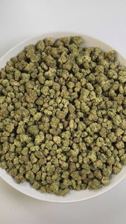 PUFFY Gelato 25 (smalls) is an indica-dominant hybrid THCa strain, born from the renowned cross of Thin Mint Girl Scout Cookies and Sunset Sherbet. The aroma bursts with sweet, fruity notes layered over a pungent, gassy undertone. Visually, dense buds show bright green hues, orange pistils, and a frosty trichome finish. Consumers often experience a calming wave of contentment, uplifted spirits, and a boost in appetite, with effects that seamlessly blend gentle mental invigoration and soothing physical ease.