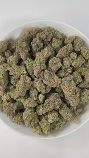 PUFFY Blue Dream is a sativa-dominant hybrid THCa strain born from the legendary cross between Blueberry and Haze. The aroma opens with sweet pineapple and zesty citrus, rounded out by subtle hints of fresh blueberries. Visually stunning, its dense, bright green buds are accented by deep blue hues, fiery orange pistils, and a generous dusting of icy trichomes making it as eye-catching as it is effective. Consumers often report a euphoric, uplifting head high that flows into a gentle, motivating body buzz, p