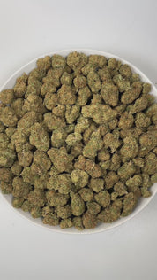 PUFFY Double Deuce is a sativa-dominant hybrid THCa strain, the result of a legendary fusion between the iconic OG Kush and the potent Jack Herer. The aroma is a pungent fusion of sharp onions, fuel-like diesel, and gassy undertones, creating a bold and intense scent that immediately commands attention. Visually, dense pine green buds with purple hues and fiery orange pistils are coated in sticky trichomes. Consumers often report a cerebral uplift that sparks creativity, euphoria, and sociability, followed 