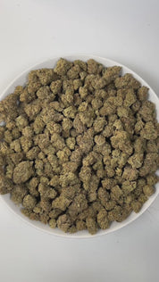 PUFFY White Lobster is a potent hybrid THCa strain born from the powerful cross between Planet Dosi 17 and Ghostface OG. The aroma is rich and gassy, with pungent undertones and a fresh, piney finish.  Visually, the buds are dense and trichome-coated, giving off a frosty, white appearance that reflects the strain’s high potency. Consumers commonly report a euphoric high that is predominantly relaxing yet mentally uplifting, making it an excellent choice for stress relief and mood enhancement.