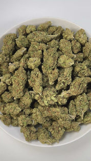 PUFFY Blue Dream is a sativa-dominant hybrid THCa strain born from the legendary cross between Blueberry and Haze. Aroma is sharp and complex, blending bold chemical notes with a cool rush of menthol and a zesty twist of citrus. Visually stunning, its dense, bright green buds are accented by deep blue hues, fiery orange pistils, and a generous dusting of icy trichomes making it as eye-catching as it is effective. Consumers often report a euphoric, uplifting head high that flows into a gentle, motivating bod