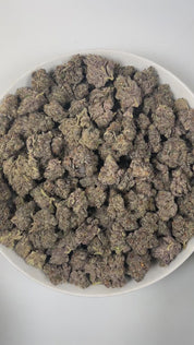 PUFFY Sapphire Cherry is a balanced hybrid THCa strain, expertly bred by crossing the iconic Sapphire OG and Glazed Cherry. The aroma is a lively fusion of juicy cherry, earthy dank undertones, and subtle floral hints. Visually, the buds are thick and compact, showcasing lush forest green and regal purple tones, highlighted by bright orange pistils and a frosty coating of trichomes. Consumers often report a blend of euphoric, happy, and uplifted mood paired with gentle relaxation and increased appetite, del
