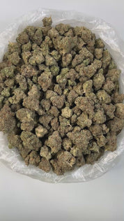 PUFFY Chem OG is a balanced premium hybrid THCa strain born from the iconic cross between Chemdawg and OG Kush. The aroma is unmistakably pungent, an intense fusion of sharp chemical notes, savory garlic, and a deep, stinky funk that hits hard and lingers in the air. Visually striking, its dense buds feature dark green leaves accented by vibrant orange pistils and a heavy coating of frosty trichomes. Consumers often report a wave of uplifting happiness that gradually melts into deep, soothing sedation makin