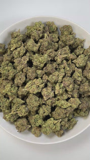 PUFFY Candy Gelato is a balanced hybrid THCa strain born from a complex cross of Blue Oreoz × Cotton Candy Gelato / Candyland × GG4 × Gelato. The aroma is a bold fusion of sweet candy notes, sharp gassy undertones, and a punch of chemical sharpness that creates a strikingly memorable profile. Visually, its dense, colorful nugs range from dark forest green to vibrant purple, often coated in a heavy layer of frosty trichomes. Consumers commonly report a fast-acting euphoric lift, delivering mental stimulation