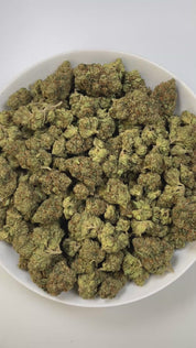 PUFFY King Louis XIII is an indica-dominant hybrid THCa strain, crafted from the legendary lineage of OG Kush × LA Confidential. The aroma is rich and bold, with strong gassy notes layered over hints of pine and a touch of warm, earthy spices. Visually, the buds are dense and dark green with bright orange pistils and a sparkling, sticky trichome coat. Consumers often report a powerful body high that eases into deep relaxation, pairing euphoric calm with a soothing finish that makes it best suited for evenin