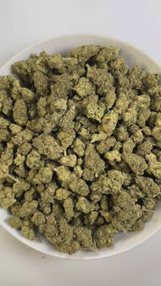PUFFY Jealousy is a balanced hybrid THCa strain, expertly crafted from a potent cross between Sherbet Bx1 and Gelato 41. The aroma bursts with a funky blend of sharp cheese and pungent garlic, creating a bold, savory scent that instantly stands out. Visually striking, the dense buds display dark purple hues, vivid greens, and fiery orange pistils, all dusted with frosty trichomes. Consumers often note a balanced experience that eases stress and lifts the mood while blending mental relaxation with energetic